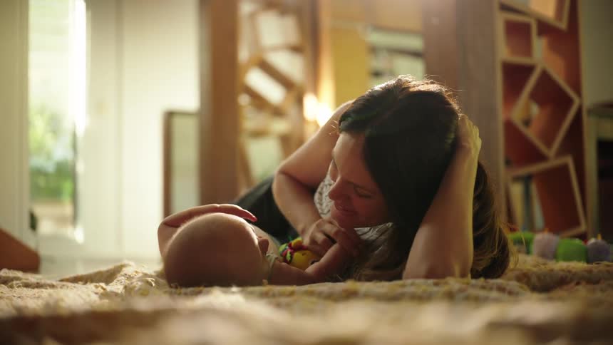 Mother palying with baby