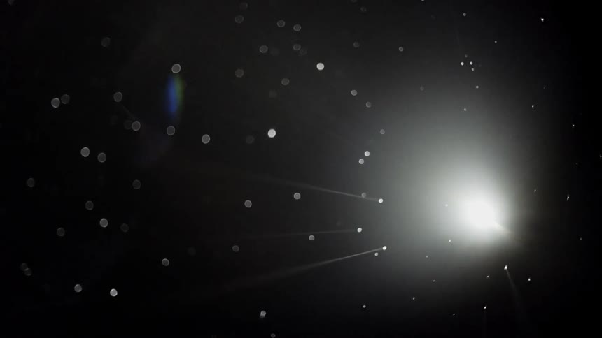 The dark area has little stars with light shining