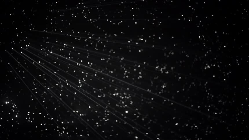 Strings stretch from pin holes in the ceiling that look like stars