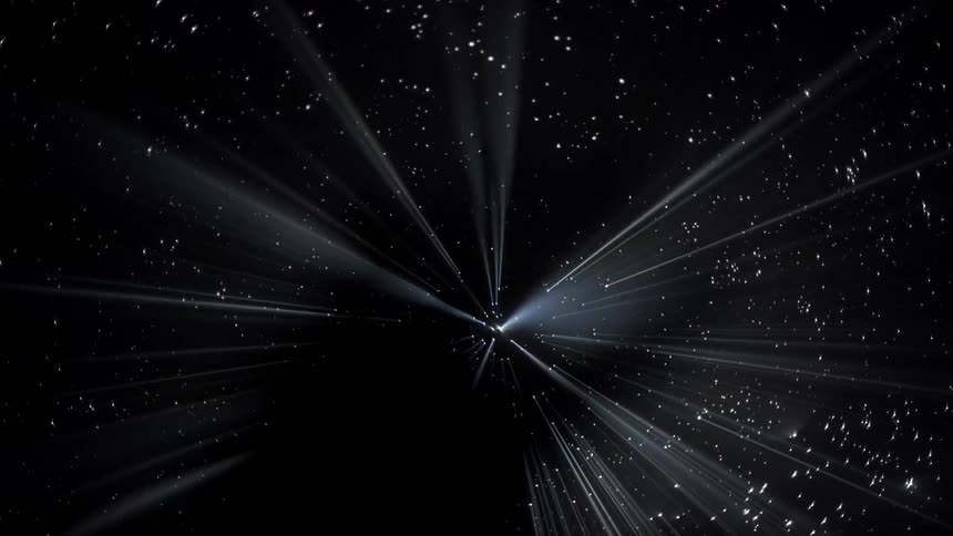 The black ceiling above has light shining in through holes