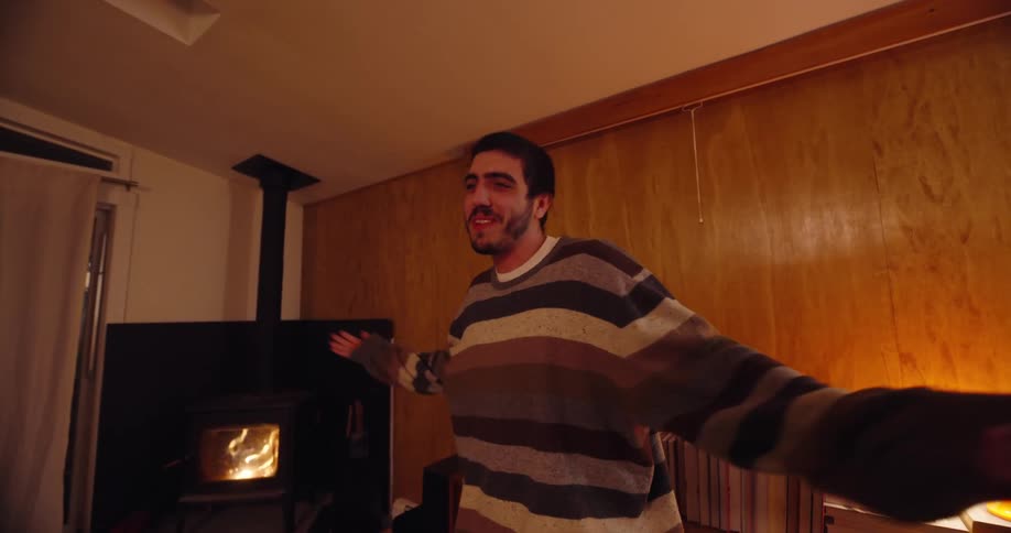 Group of friends in the living room playing charades