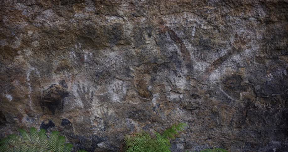 Stencil drawings on a cliff face