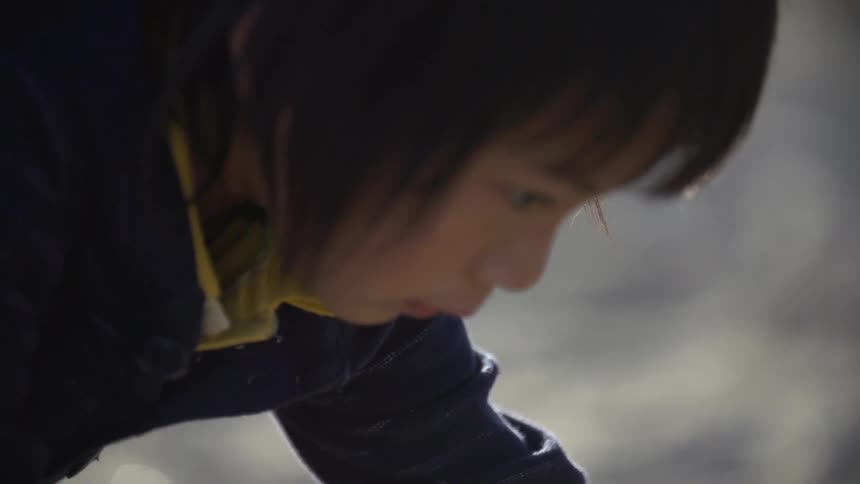 A child looking downwards
