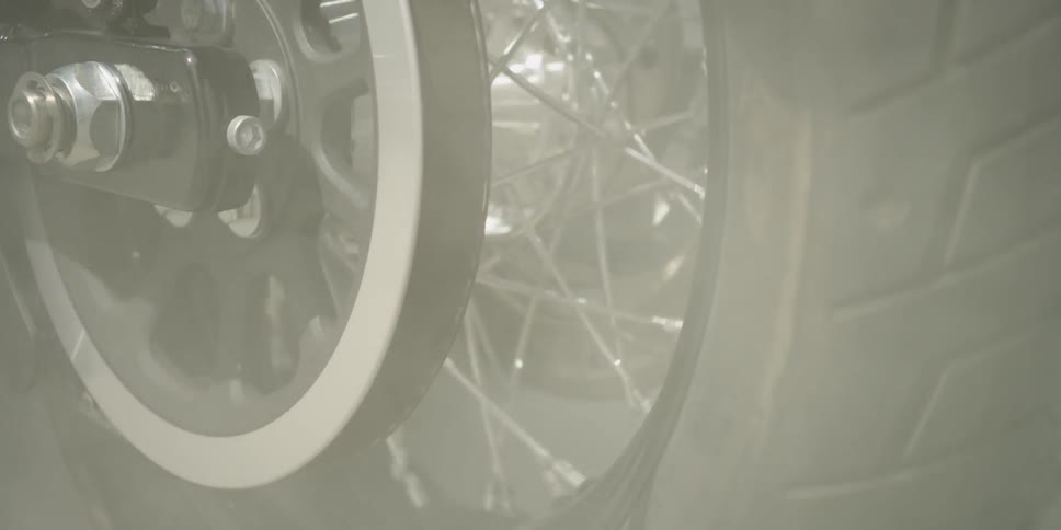 Closeup of a motorcycle wheel spinning quickly