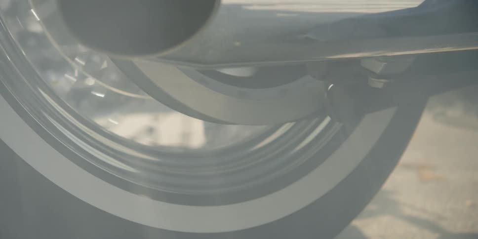 A tire spins on concrete