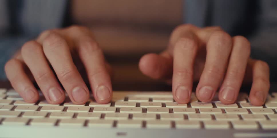 A close up footage of a person typing