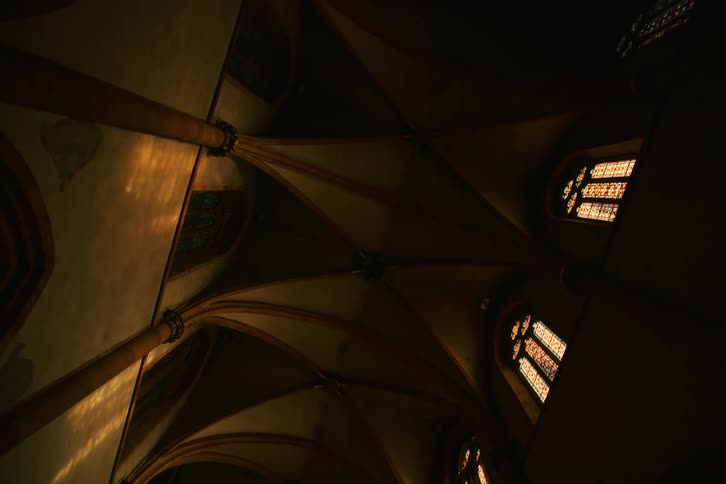 The ceiling in the church is arched
