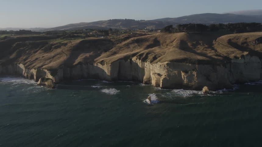 A rocky jagged cliff side