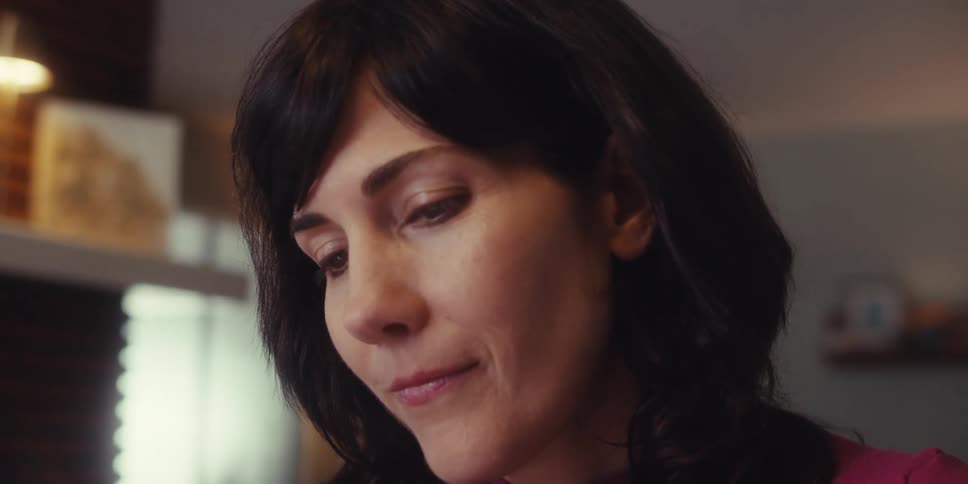 A woman is nodding her head