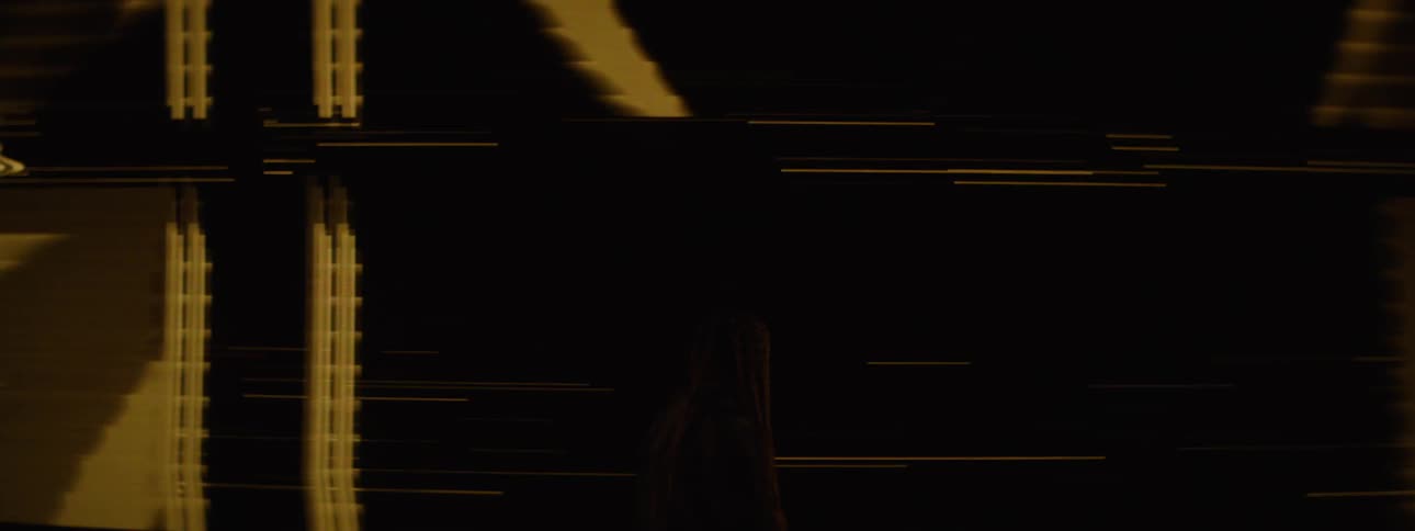 The wall is lit up with flashing lights and a no signal projection