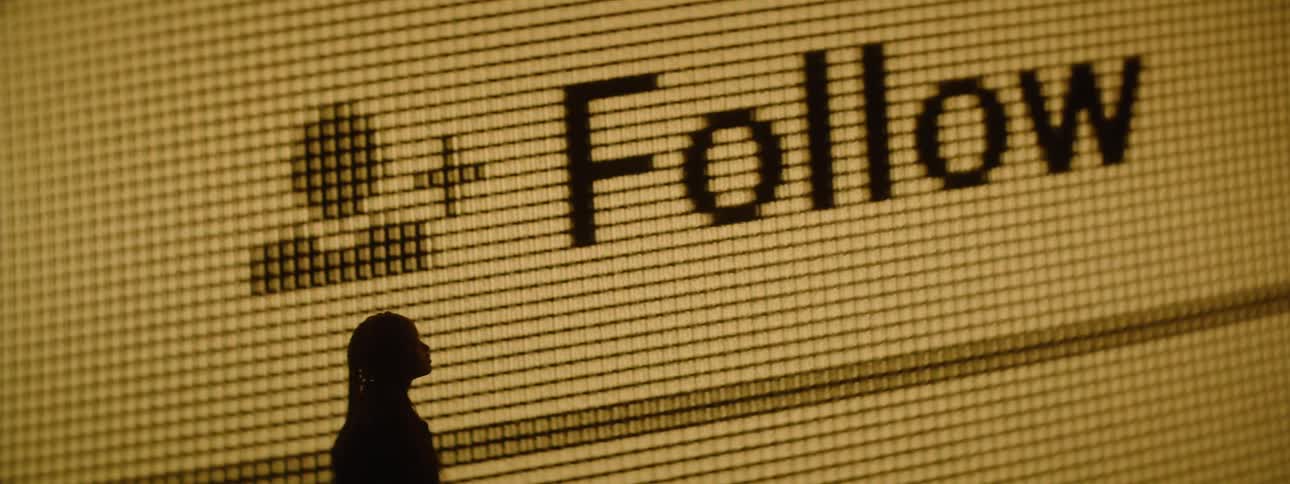 Closeup of a mouse cursor moving on a screen