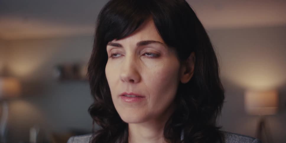 A close up footage of a ladys face smiling