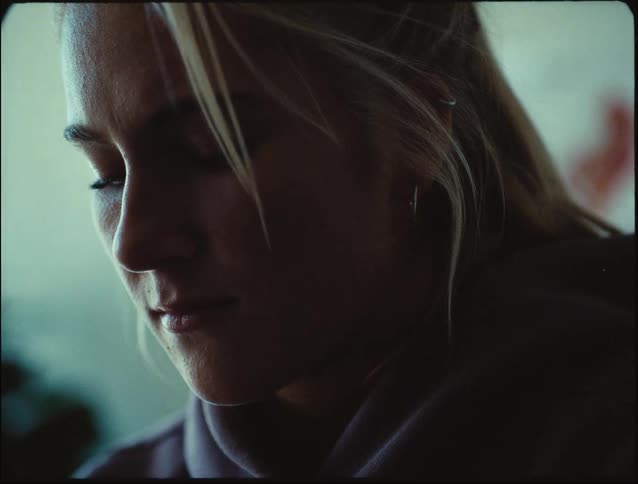 Blonde woman with closed eyes