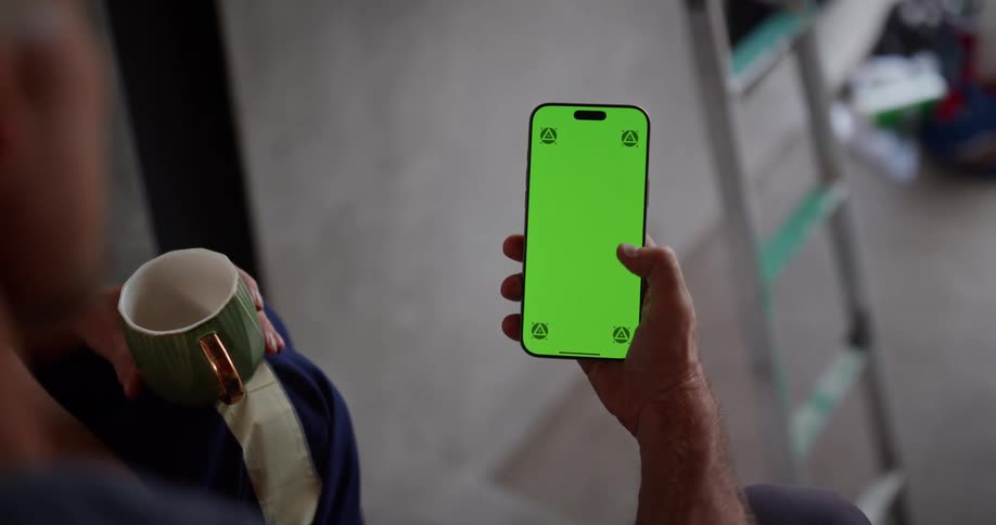 A person is sliding on their cell phone