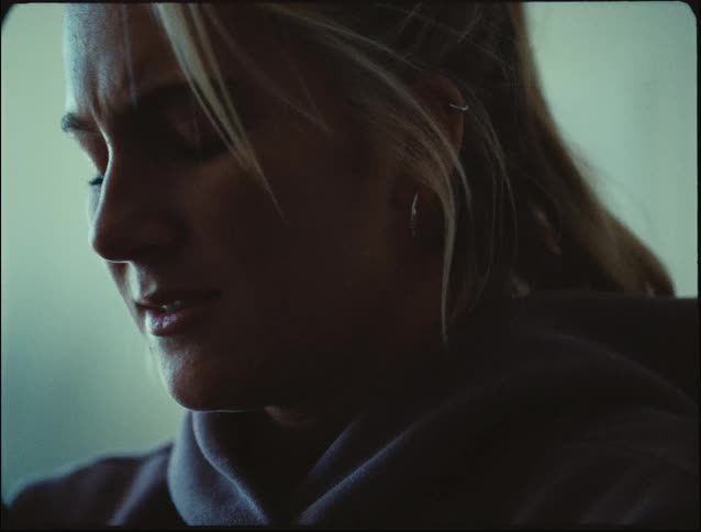 A close up clip of a depressed and worried lady
