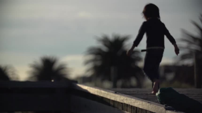A child runs down a path