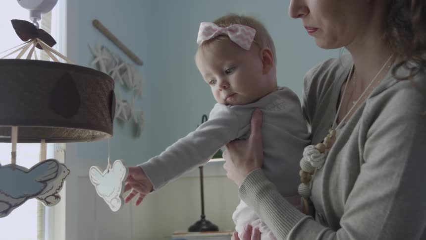 A person holding a baby