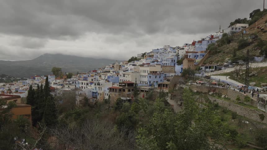 A village with many homes is on the mountain