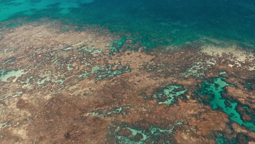 Aerial view of an archipelago with crystal clear blue waters