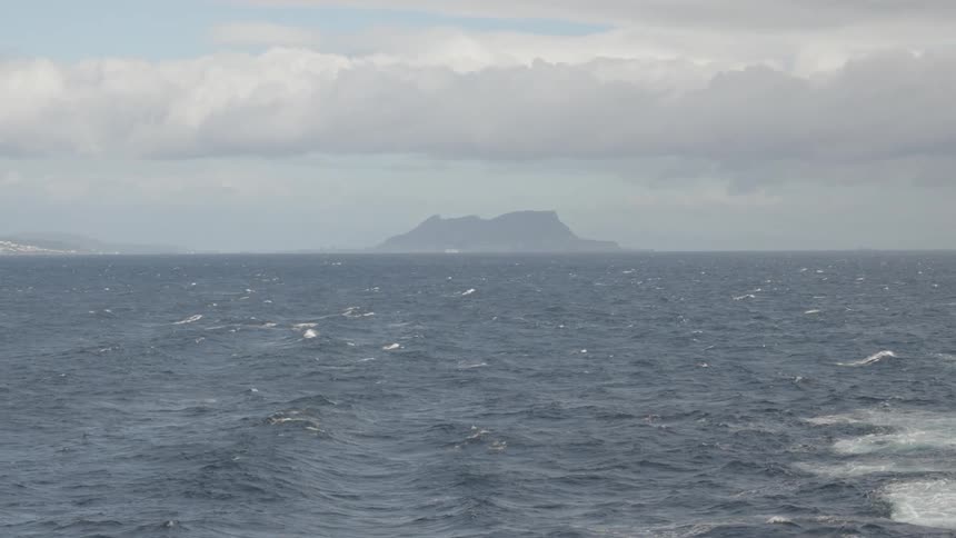 Landscape of the ocean surface at daytime with small waves