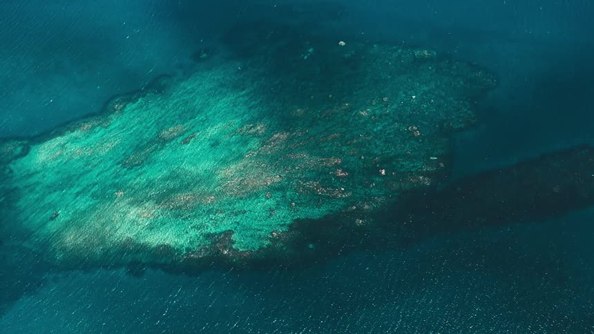 Aerial landscape of an archipelago surrounded by a turquoise blue sea