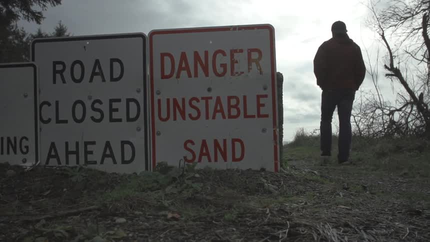 Road signs in the dirt