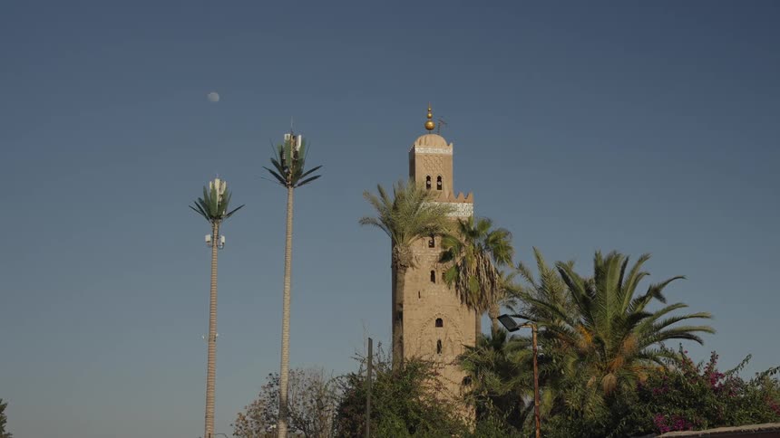 A tall bell tower is under the clear sky