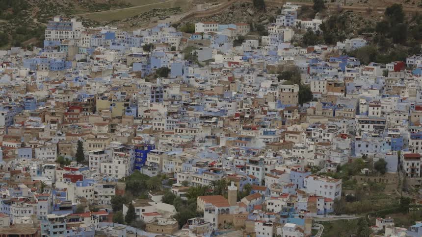 Aerial of white painted buildings in a city at daytime