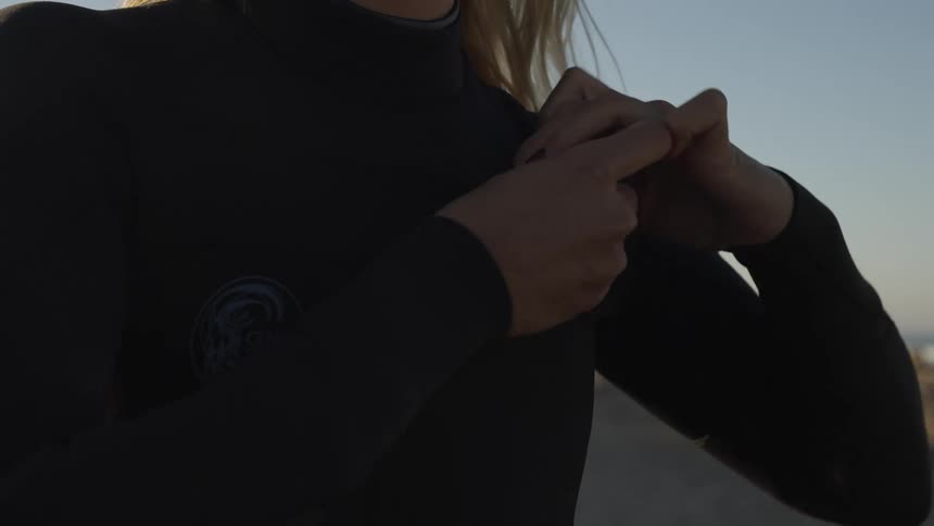 A footage of a lady wearing a suite