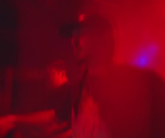 Two men are dancing in the club