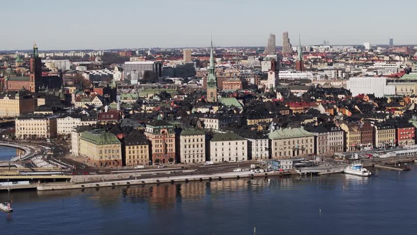 The docks are on the shore of the city