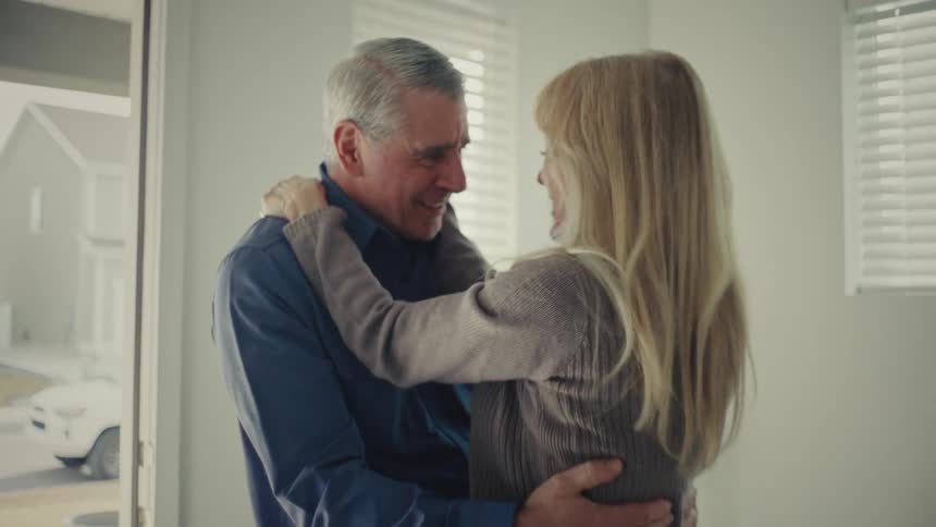Couple in an indoor space hugging each other