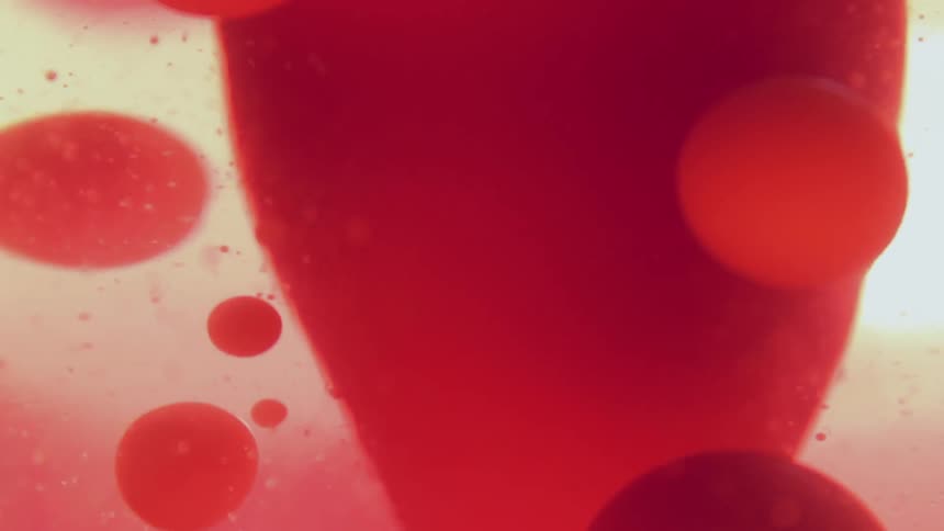 Red blobs of liquid bubbling up