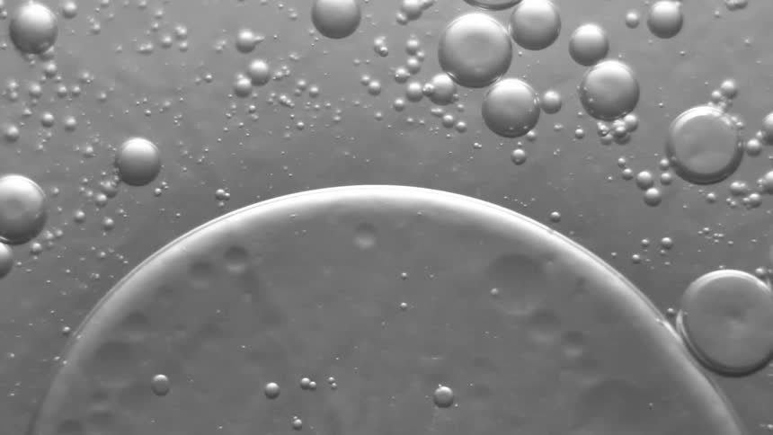 Bubbles of liquid slowly falling