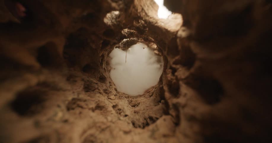 A close up footage of smokes in a hole