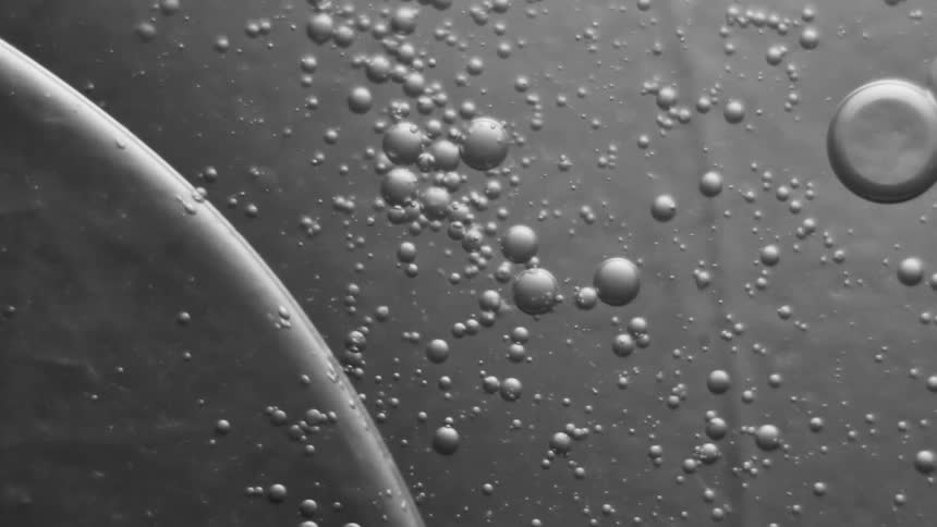 Bubbles flow in clear liquid