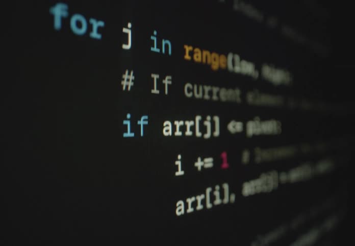 A closeup shot of a computer screen displaying code with the function name partition in focus capturing the essence of programming in progress