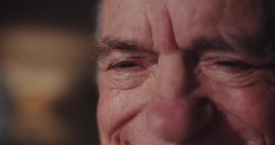 The man begins laughing