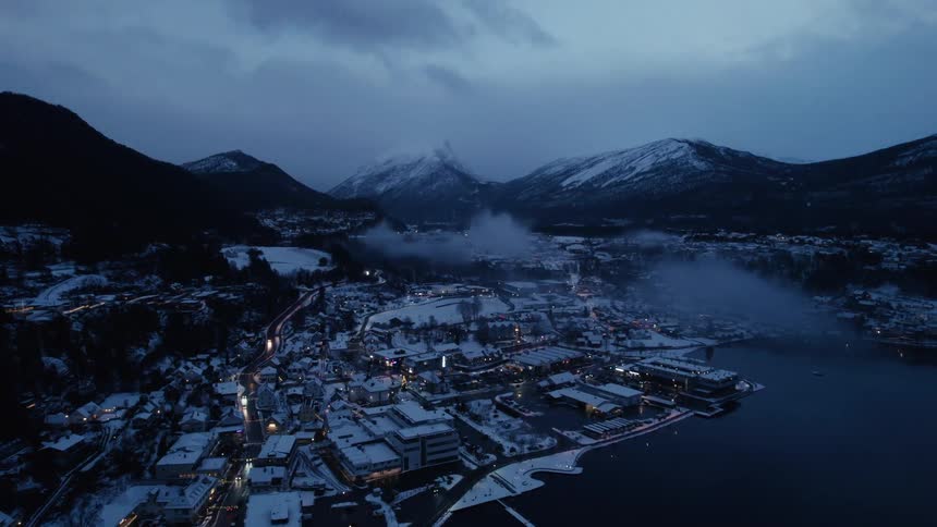 Aerial view of a town by the sea on a cloudy winter morning