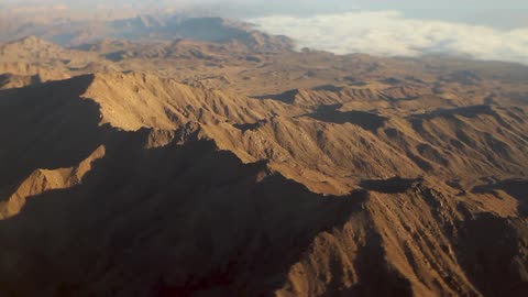 Mountain ridges are shown below