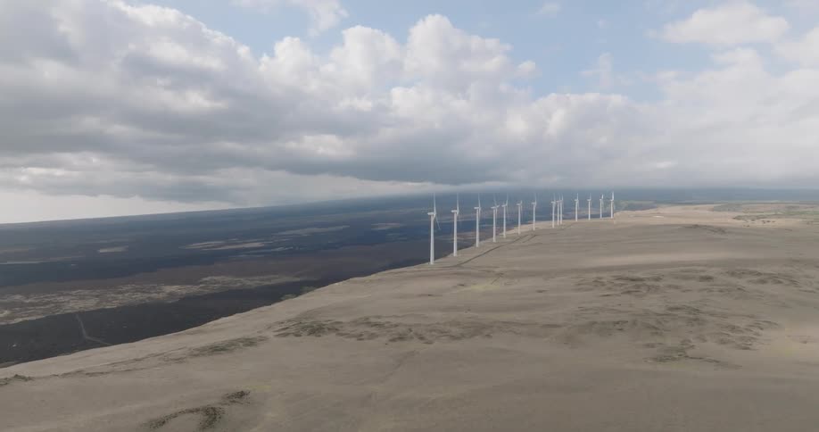 Windmills line the cliff on the landscape