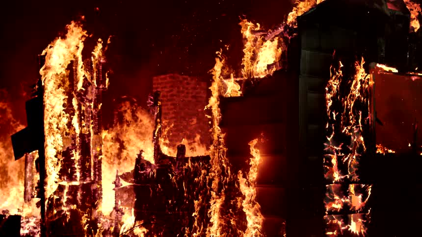 The home is almost entirely burned down and in flames