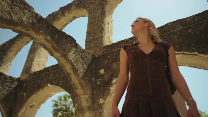 A couple are viewing some ruins