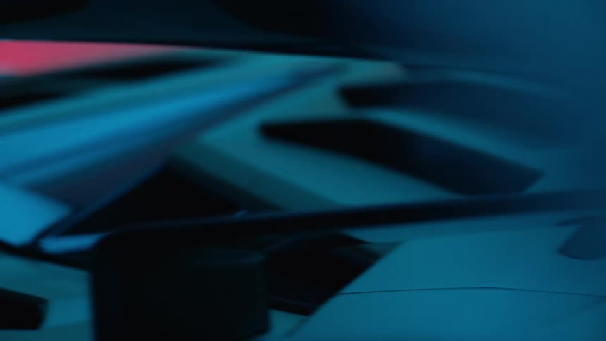A close up of some metal parts under blue light