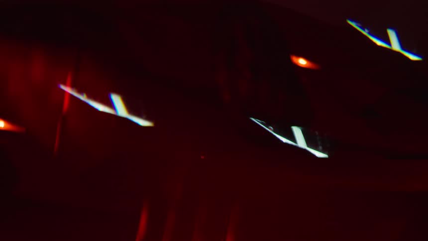 Multiple car images are superimposed against a dark background