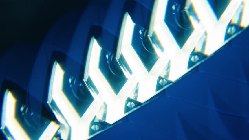 Closeup of a lamborghinis multiple exposure headlight