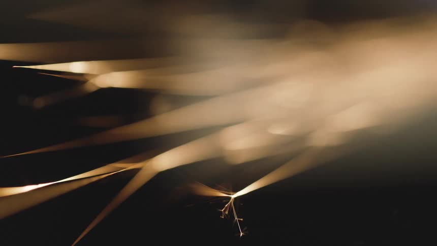 Sparks created by a tool grinding a metal object become streaks of light