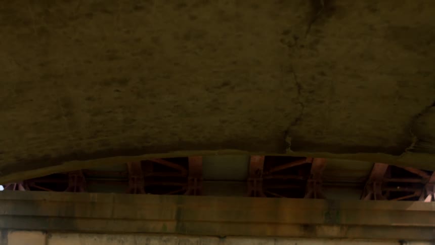 The cement arch leads underneath to the overpass