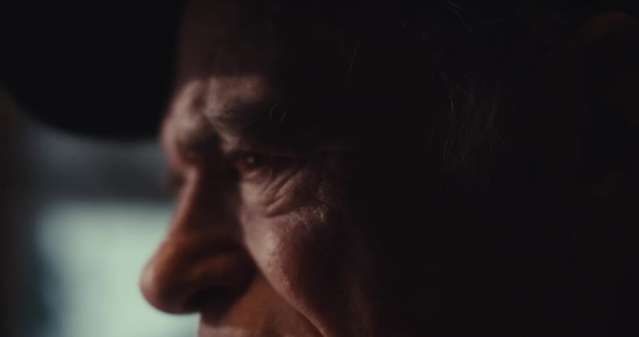 A man begins to smile at home