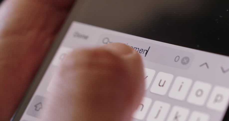The person searches retirement on their cell phone